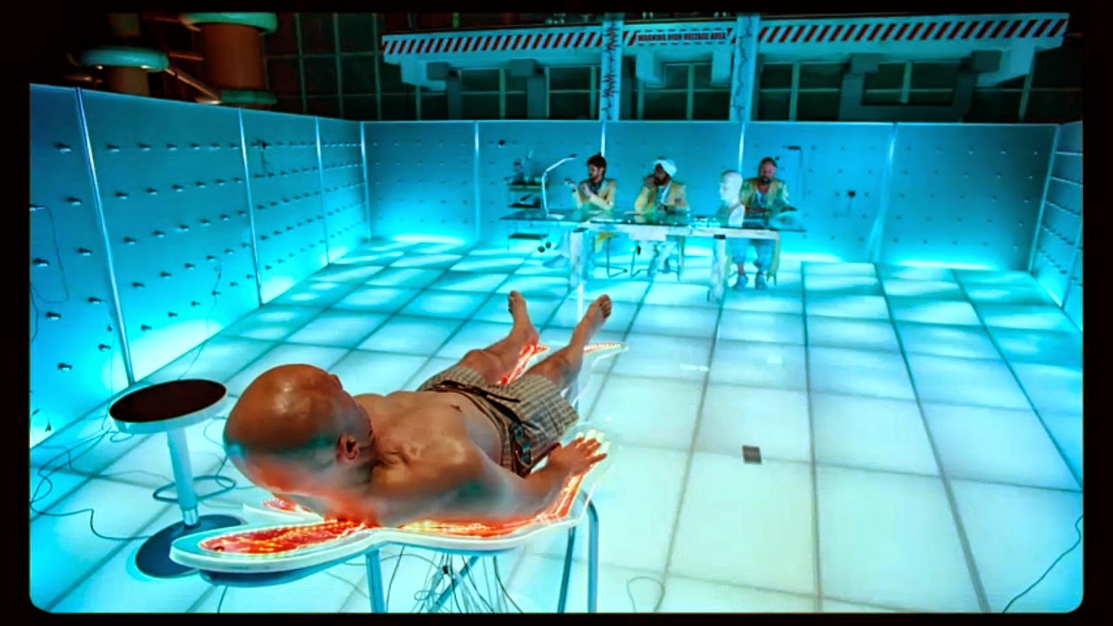 Qohen Leth (Chrisoph Waltz) undergoes evaluation by company doctors in The Zero Theorem (2013)