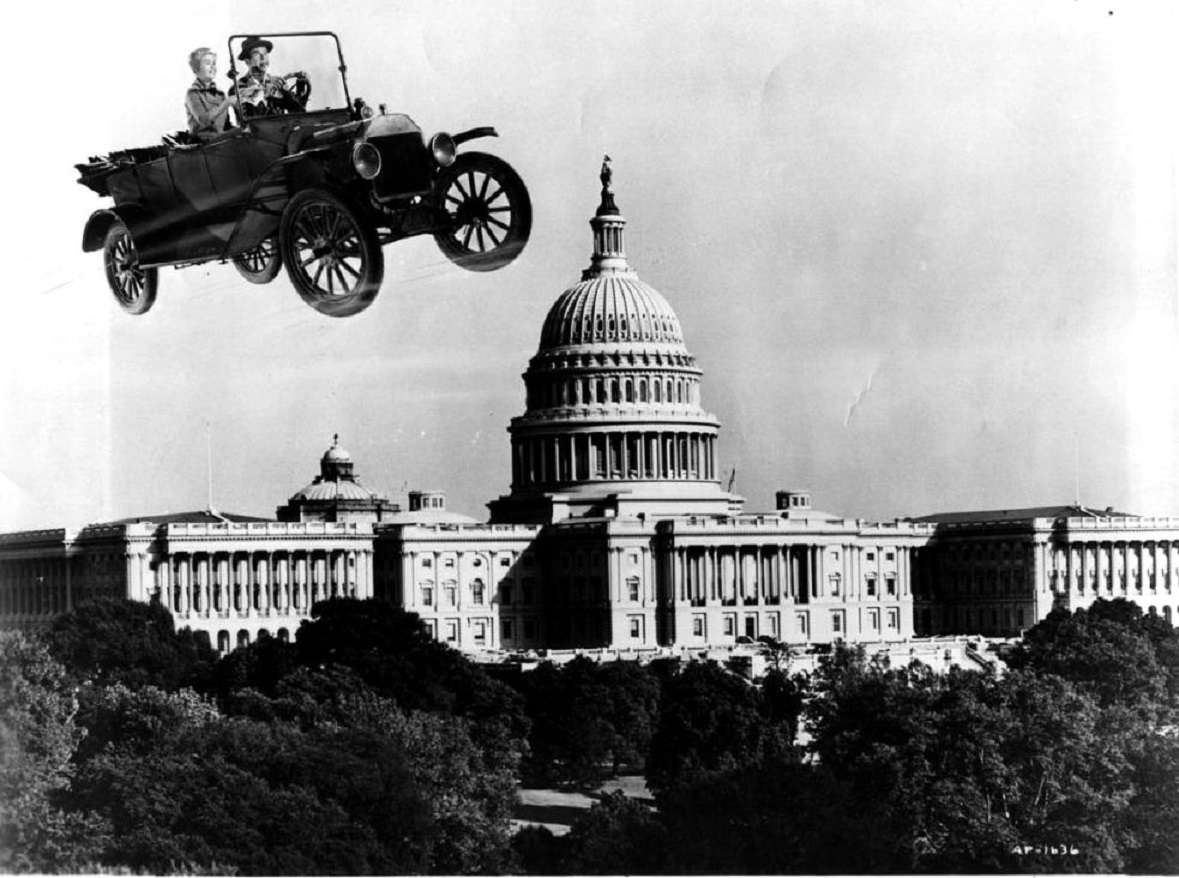 Professor Ned Brainard (Fred MacMurray) and his fiancee Betsy Carlisle (Nancy Olson) fly to Washington D.C. in his flubber-powered flying Model T in The Absent-Minded Professor (1961)