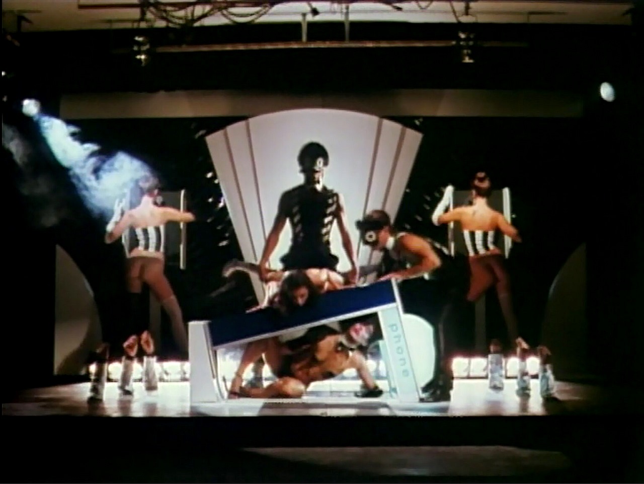 Performers in telephone routine in Cafe Flesh (1982)