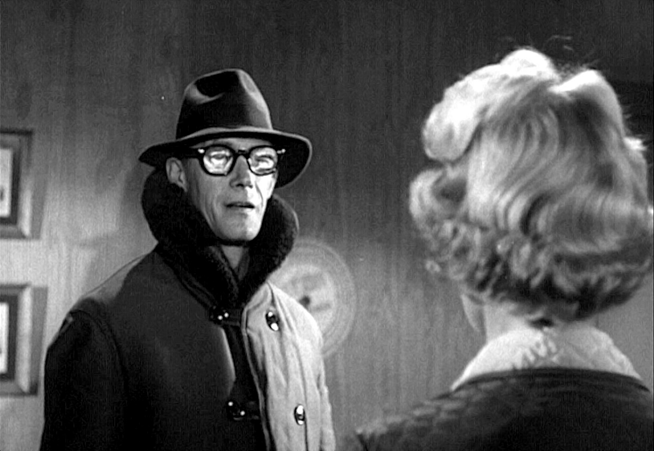The Cosmic Man (John Carradine) appears to Angela Greene in The Cosmic Man (1959)