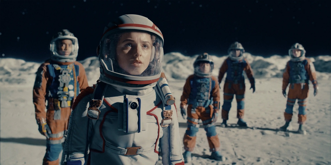 Isaiah Russell-Bailey, McKenna Grace, Orson Hong, Thomas Boyce and Billy Barratt on the lunar surface in Crater (2023)