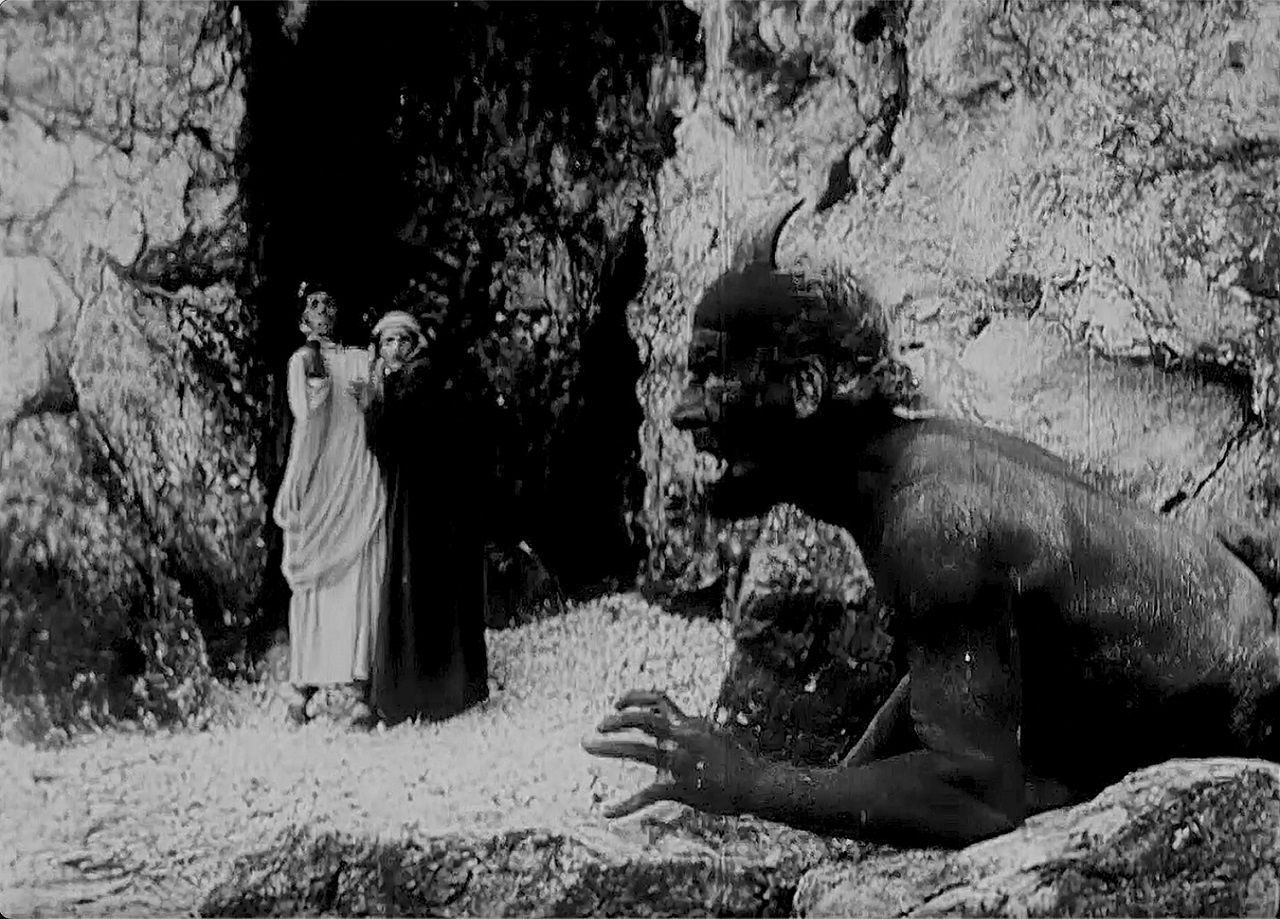 Virgil (Arturo Pirovano) and Dante (Salvatore Papa) encounter a demon in Dante's Inferno (1911)