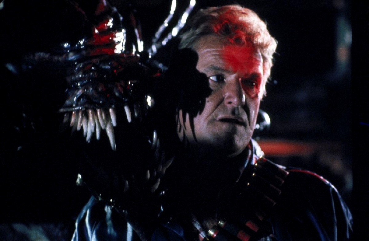 Charles Napier and alien monster in Deep Space (1988)
