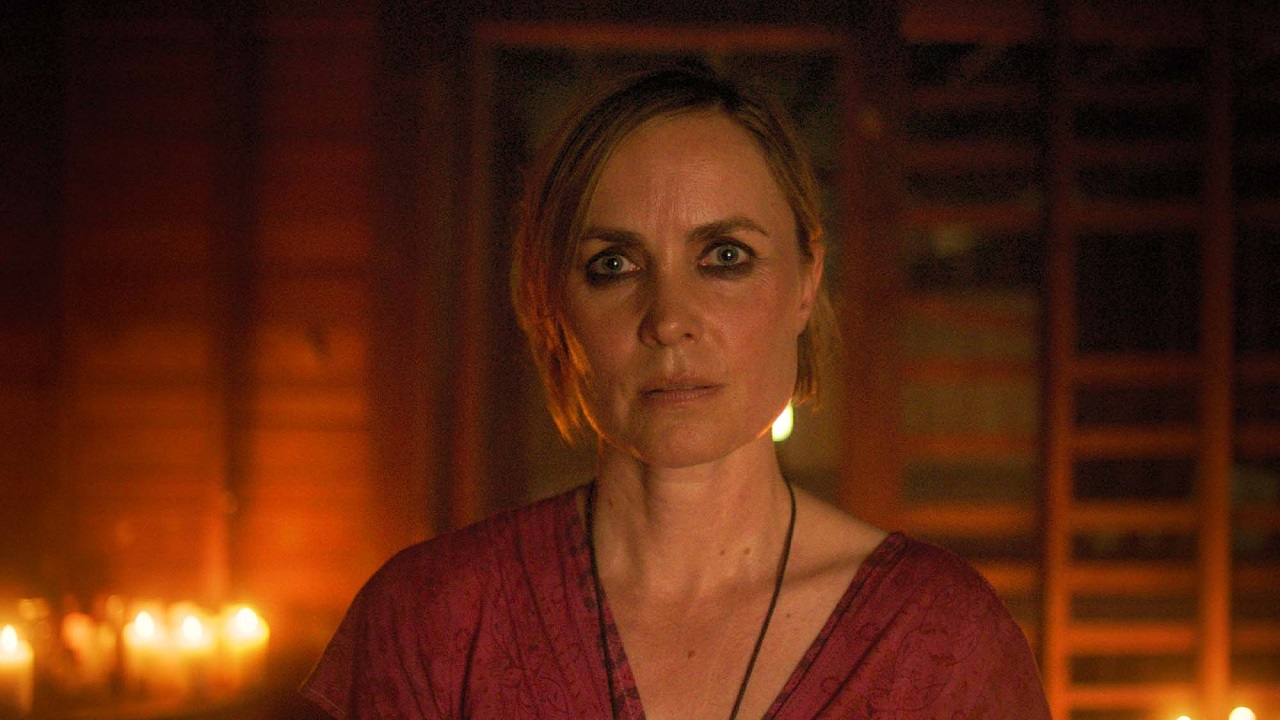 Radha Mitchell as the exorcist Aliza in Devil's Workshop (2022)
