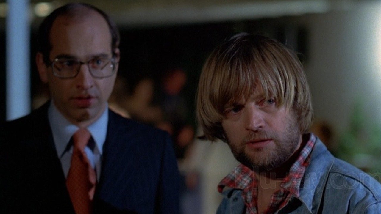 George Wyner and David McCallum in Dogs (1977)