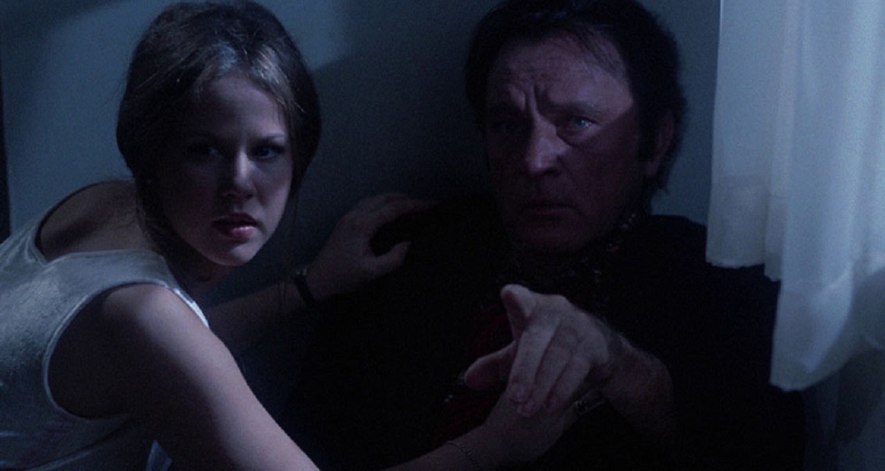 Regan MacNeil (Linda Blair) and Father Phillip Lamont (Richard Burton) in Exorcist II The Heretic (1977) 1