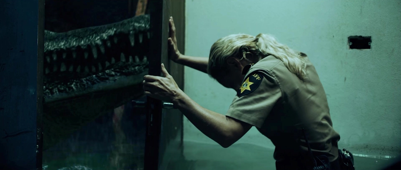 Nicky Whelan and alligator in The Flood (2023)