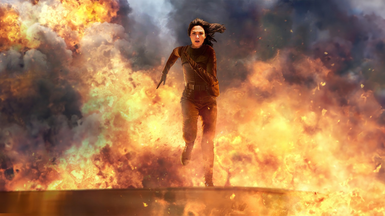 Gal Gadot dives off The Locker as it explodes in Heart of Stone (2023)