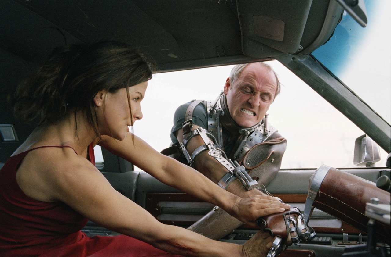 Rhona Mitra and Colm Feore in Highwaymen (2004)
