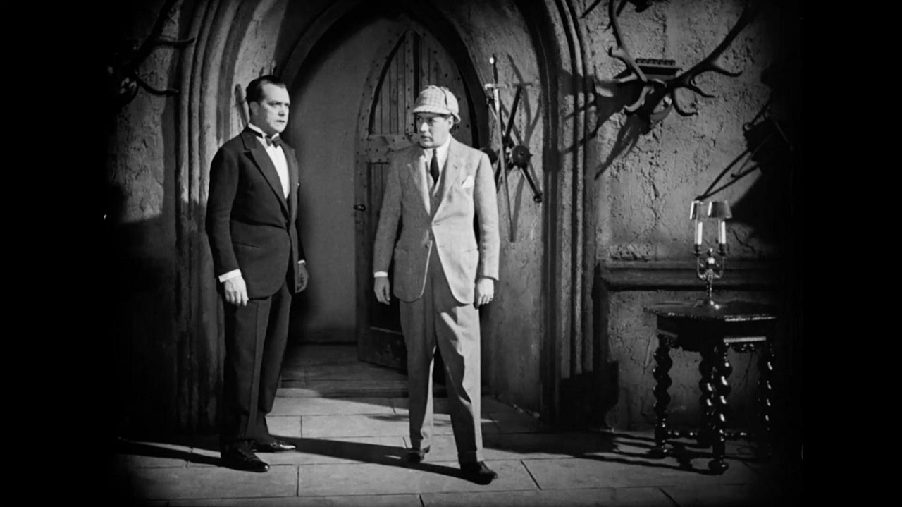 Sherlock Holmes (Carlyle Blackwell) and Dr Watson (Livio Pavanelli) in The Hound of the Baskervilles (1929)