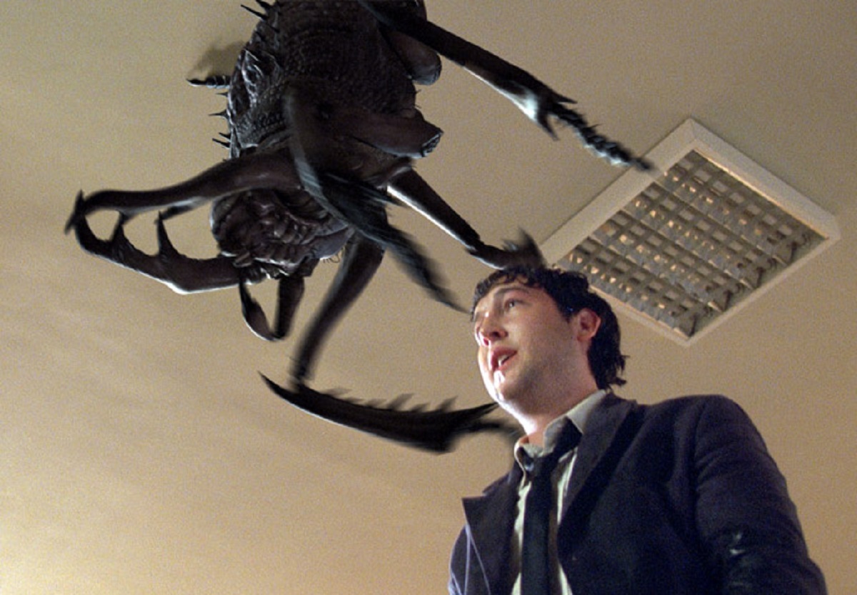 Chris Marquette with giant bug in Infestation (2009)