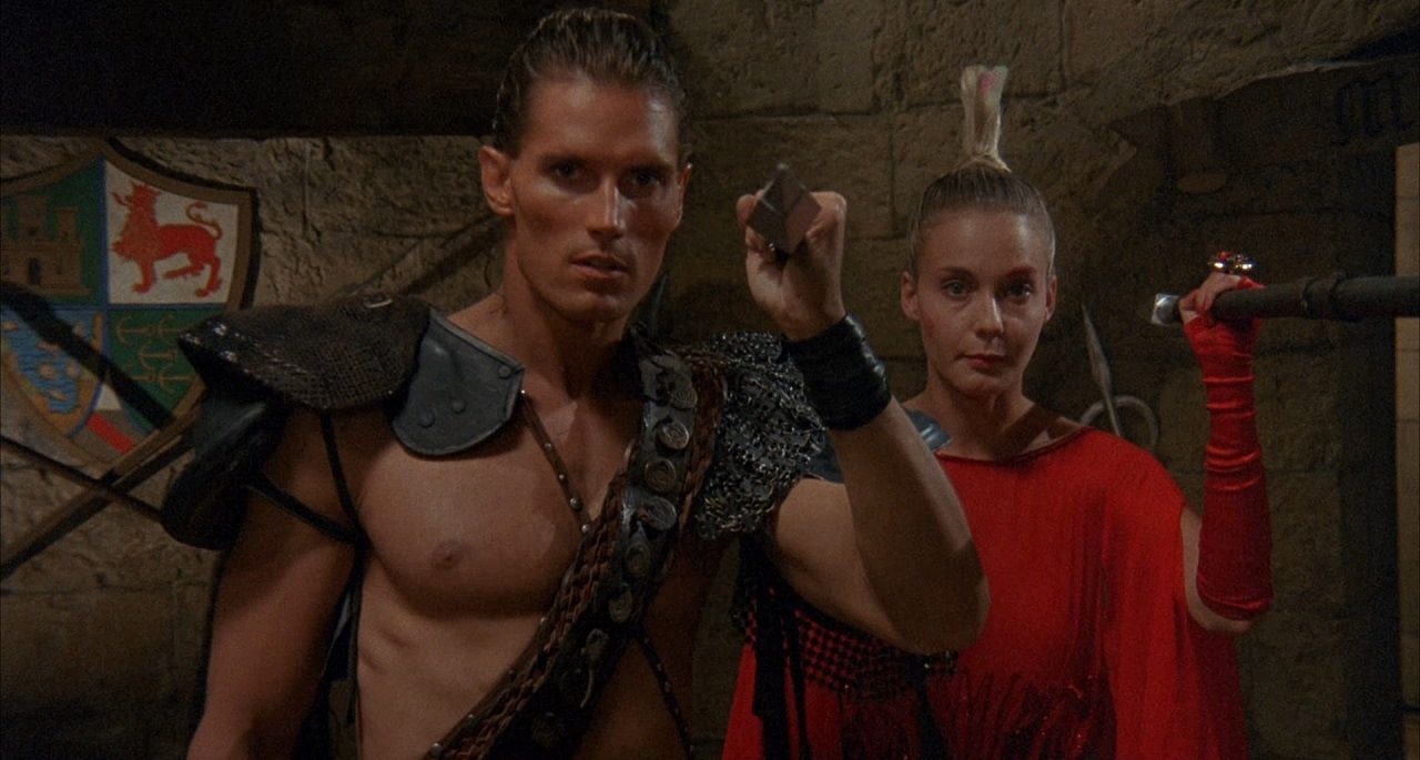 Ator (Miles O'Keeffe) and Savina Gersak in Iron Warrior (1986)