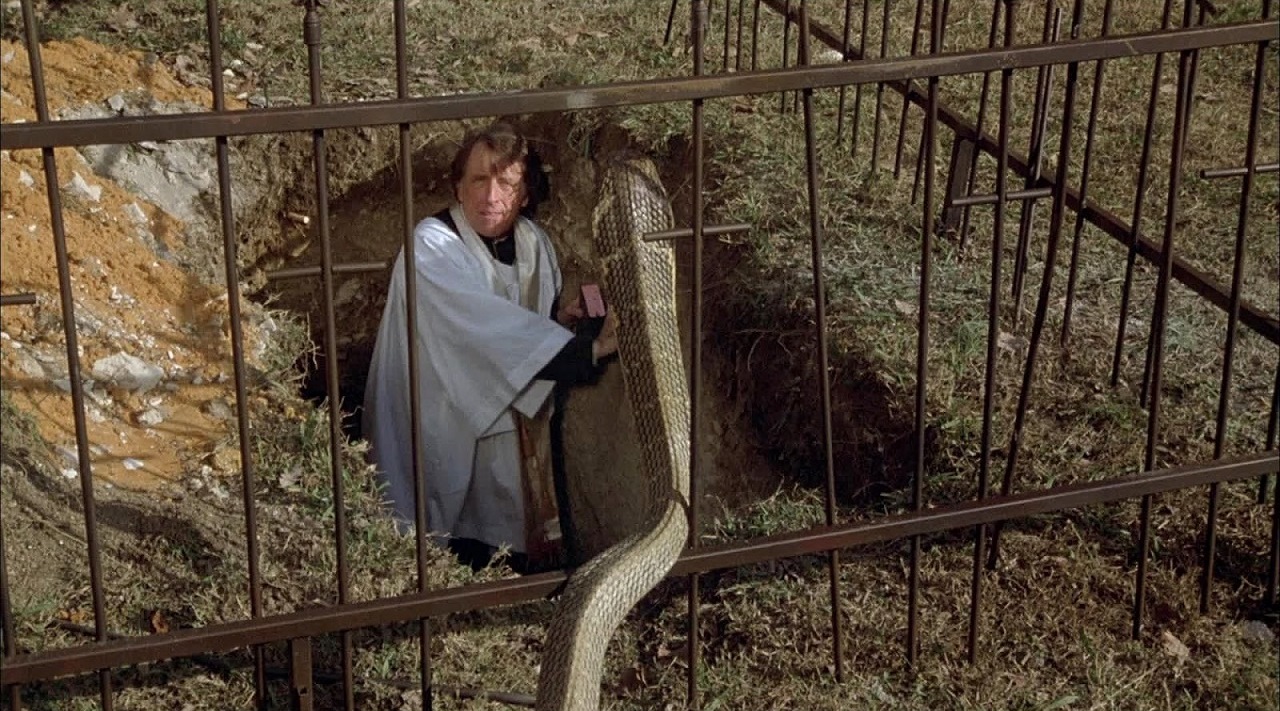 Priest Fritz Weaver vs giant snake in Jaws of Satan (1981)