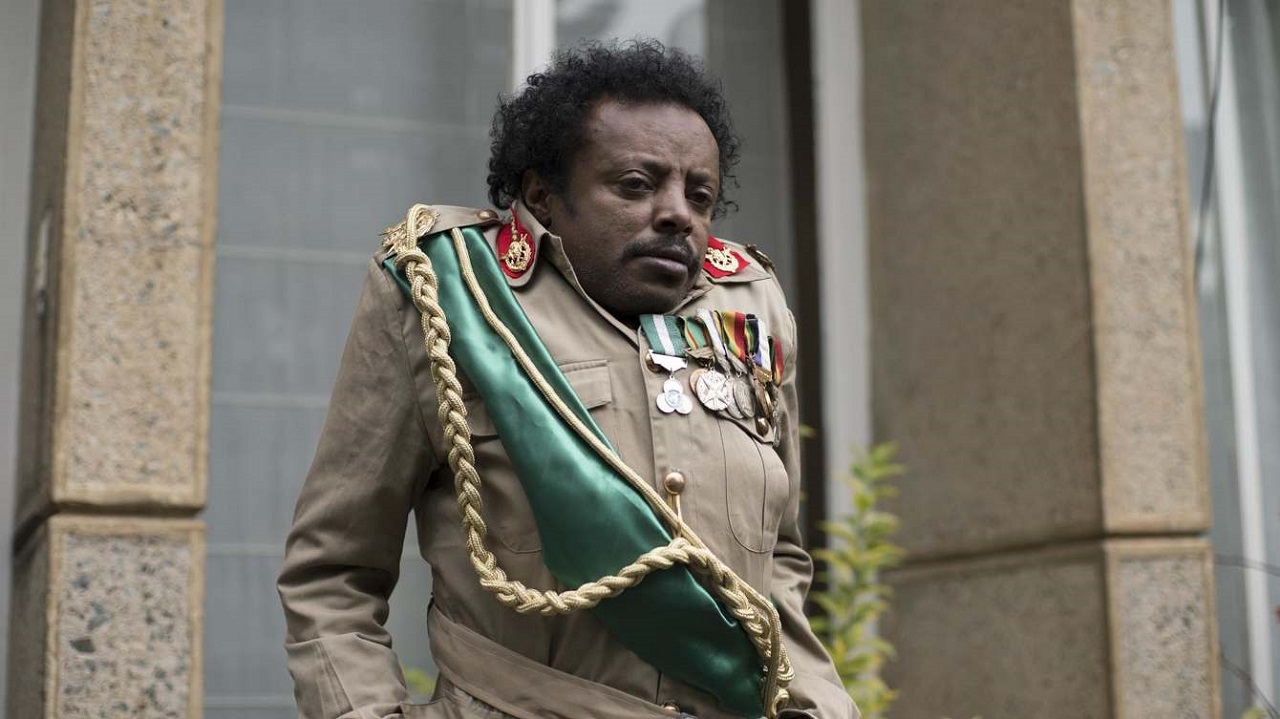 Daniel Tadesse as Agent D.T. Gagano in Jesus Shows the Way to
the Highway (2019)