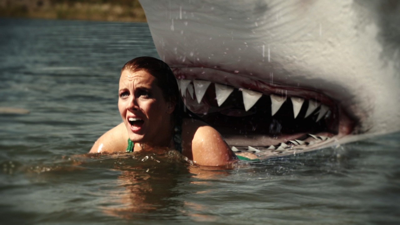 Emanuelle Carriere pursued by shark in Jurassic Shark (2012)