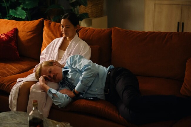 Hong Chau and Jesse Plemons in the The Death of R.M.F. episode of Kinds of Kindness (2024)