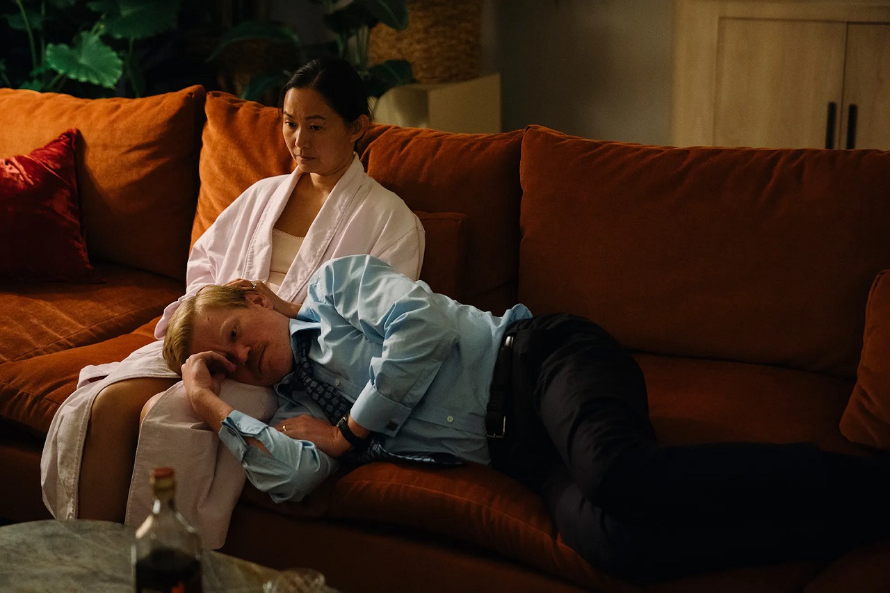 Hong Chau and Jesse Plemons in the The Death of R.M.F. episode of Kinds of Kindness (2024)