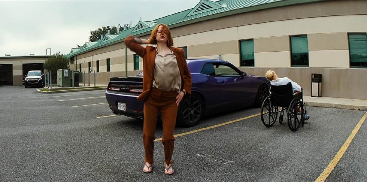 Emma Stone in R.M.F. Eats a Sandwich in Kinds of Kindness (2024)