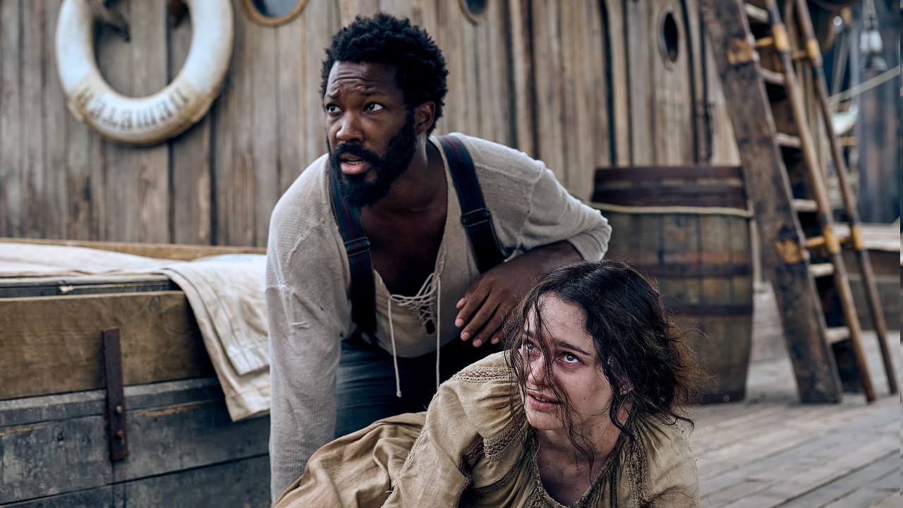 Clemens (Corey Hawkins) and Anna (Aisling Franciosi) in The Last Voyage of the Demeter (2023) 