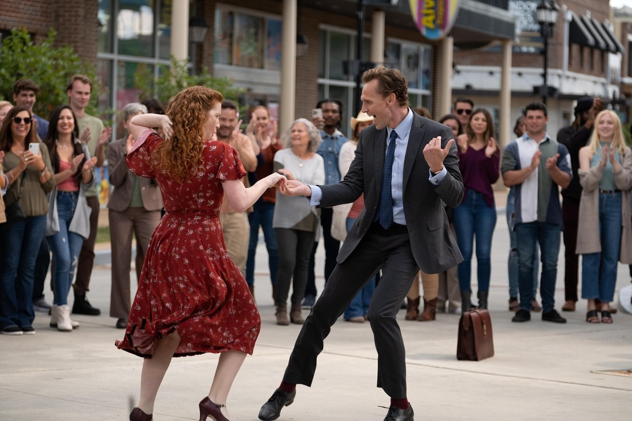 Tom Hiddleston and Annalise Basso dance in The Life of Chuck (2024)