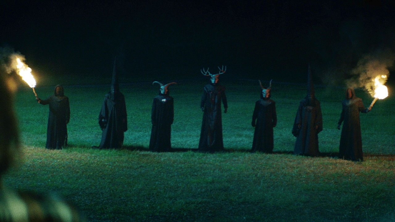Cultists gathered outside the house in The Long Night (2022)
