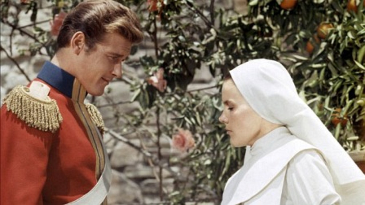 Roger Moore and Carroll Baker in The Miracle (1959)