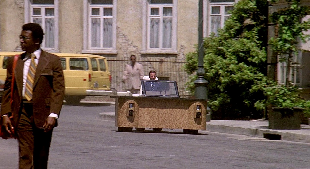 Maxwell Smart (Don Adams) driving the deskmobile in The Nude Bomb (1980)