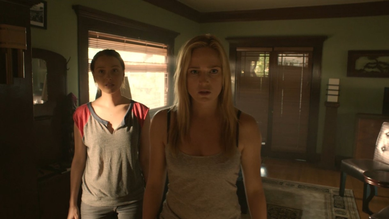 Camilla Luddington and Caity Lotz in The Pact II (2014)