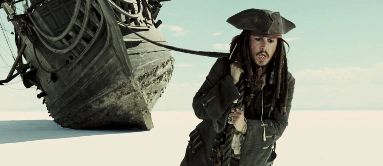 Captain Jack Sparrow (Johnny Depp) tows the Black Pearl through the afterlife in Pirates of the Caribbean: At World’s End (2007)