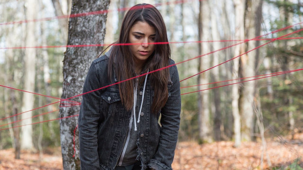 Nicole Muñoz casts a spell in the woods in Pyewacket (2017)