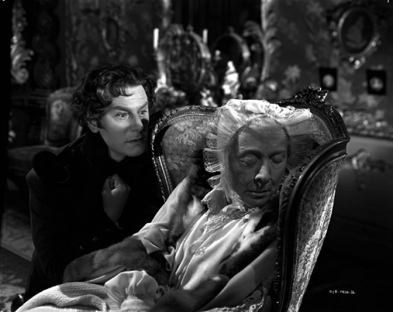 Captain Herman Suvorin (Anton Walbrook) seek the secrets of Countess Ranevskaya (Edith Evans) in The Queen of Spades (1949)