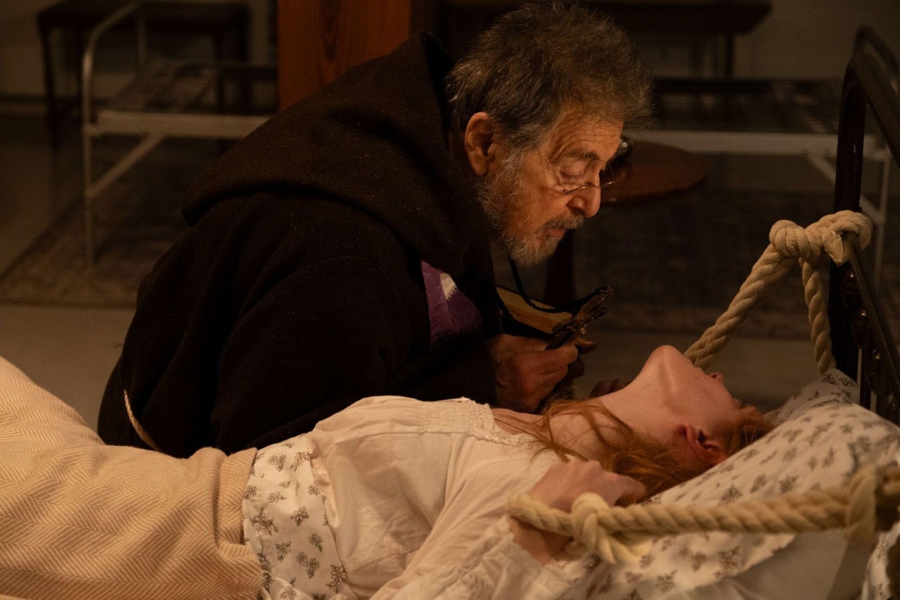 Father Theophilus Reisinger (Al Pacino) conducts the rite of exorcism on Emma Schmidt (Abigail Cowen)  in The Ritual (2025)