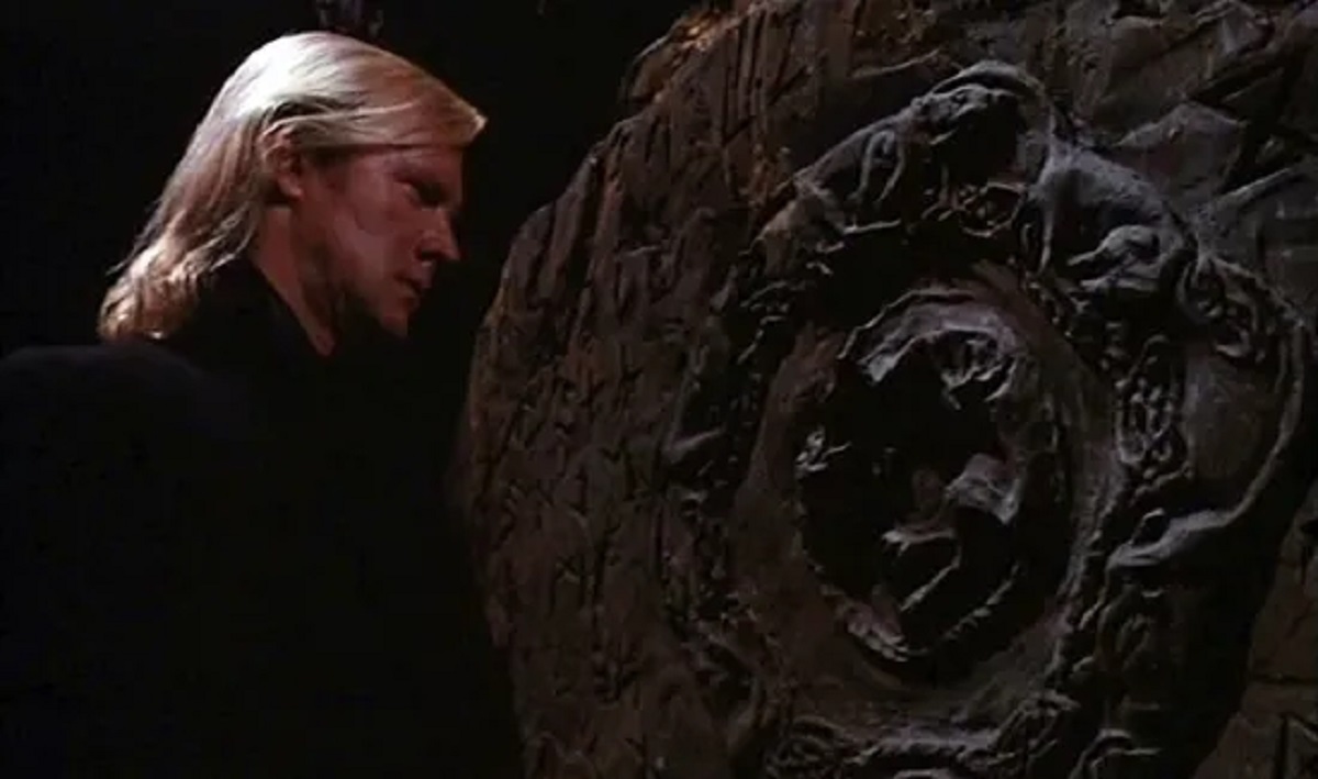 Alexander Godunov as The Clockmaker in The Runestone (1991)