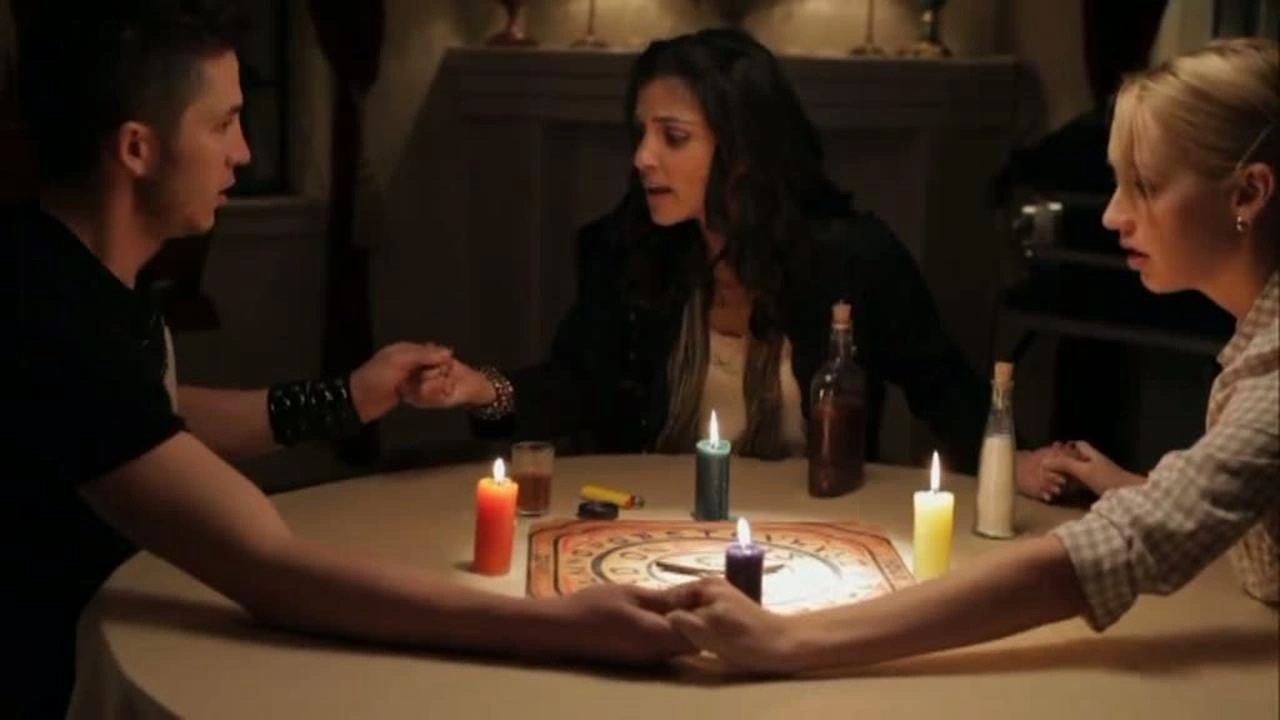 Bobby Campo, Nazneen Contractor and Devon Ogden hold a seance in Séance: The Summoning (2011)