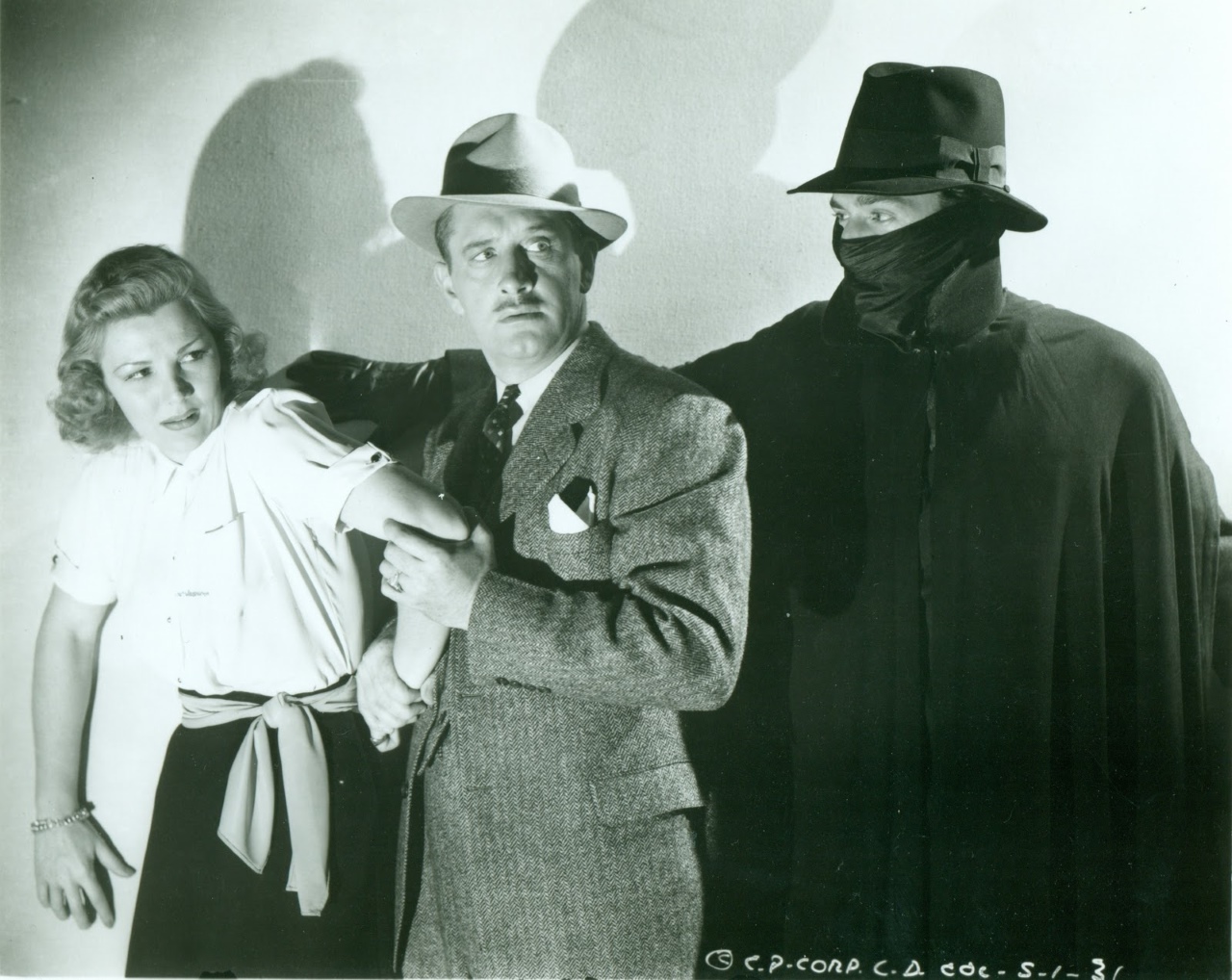 The Shadow (Victor Jory) and Margo Lane (Veda Ann Borg) in The Shadow (1940)