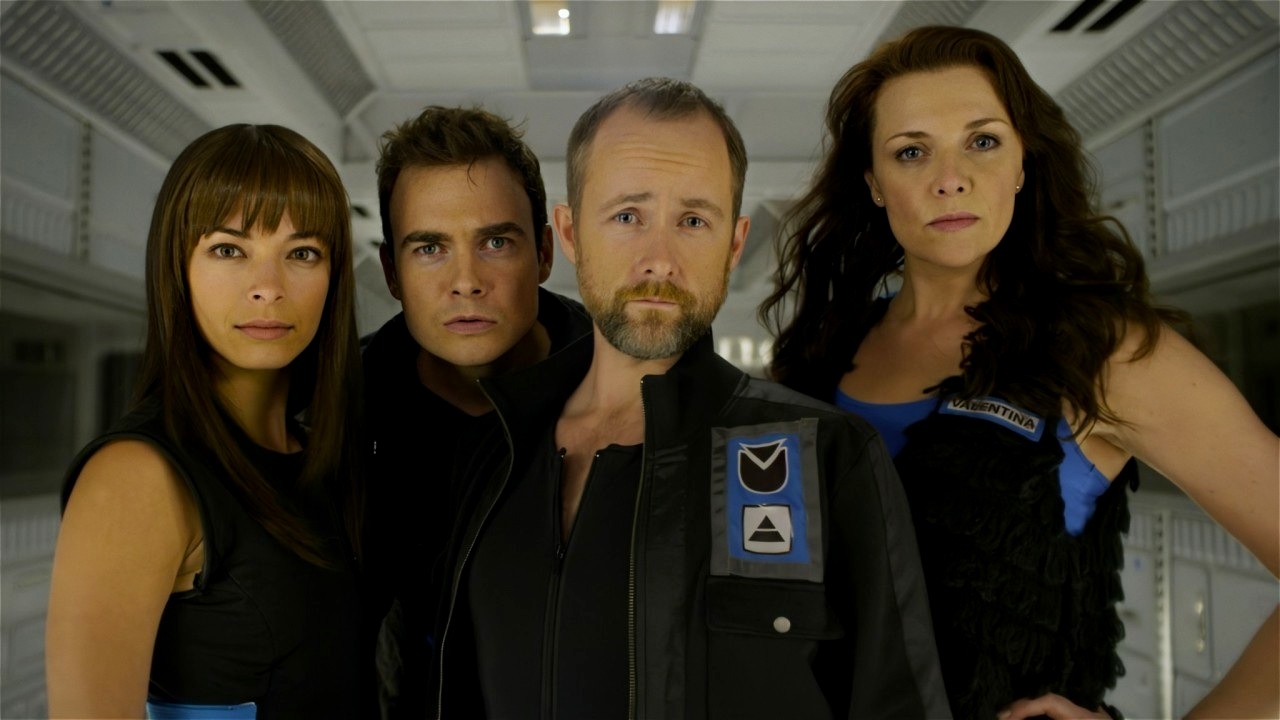 The crew of the space station - Kristin Kreuk, Robin Dunne, Billy Boyd and Amanda Tapping in Space Milkshake (2012)