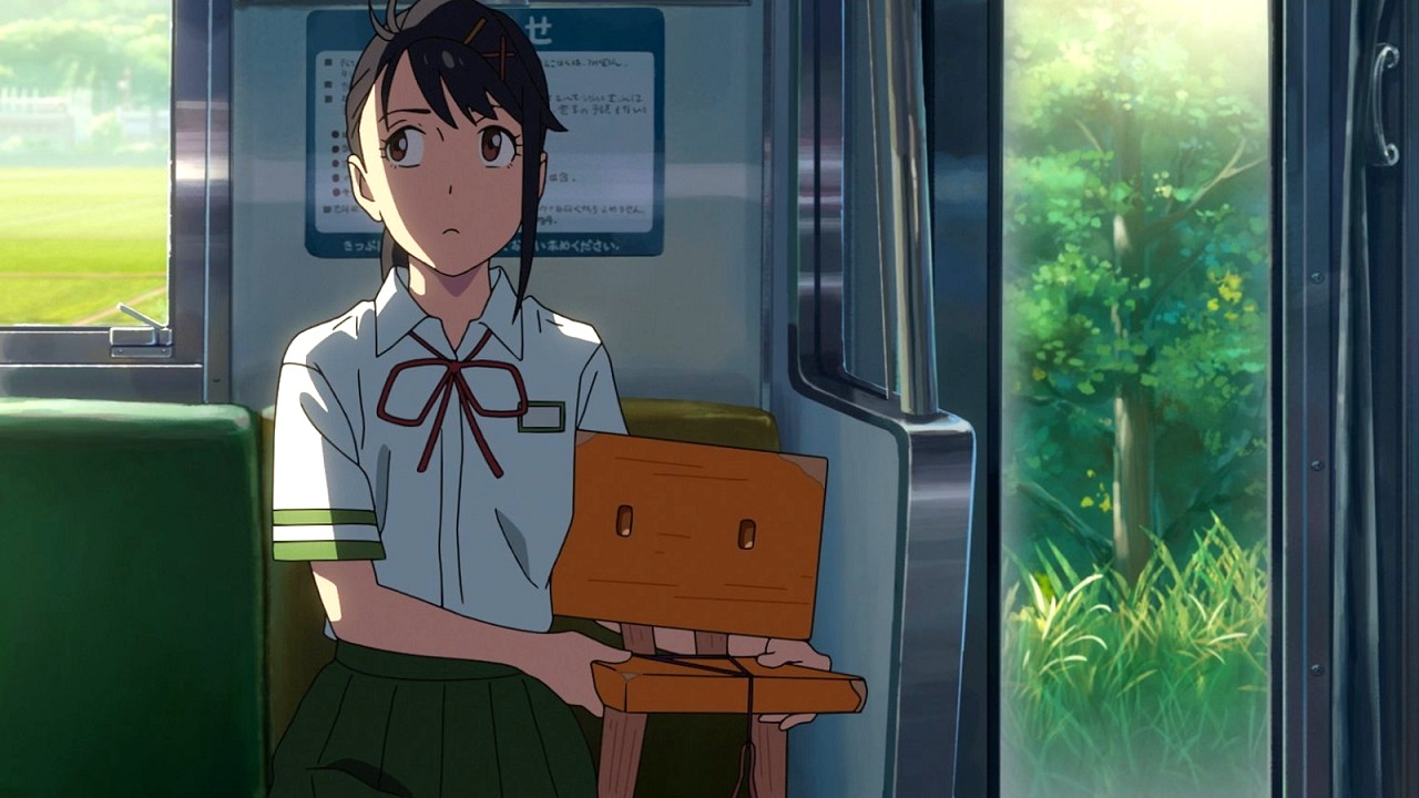 Suzume with Souta the three-legged chair in Suzume (2022)