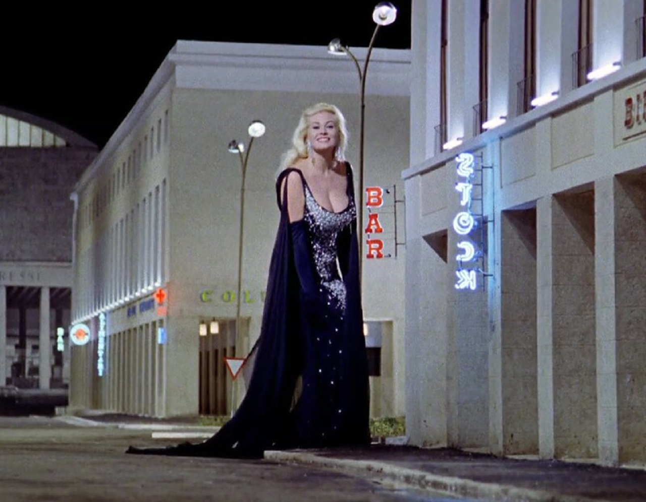 A giant sized Anita Ekberg in The Temptation of Dr Antonio (1962)