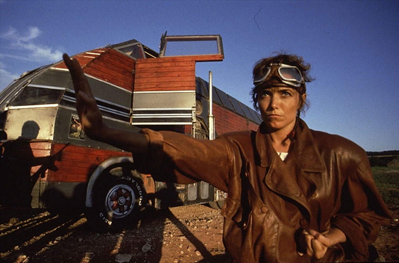 Karen Allen as the truck driver Gus in Terminus (1987)