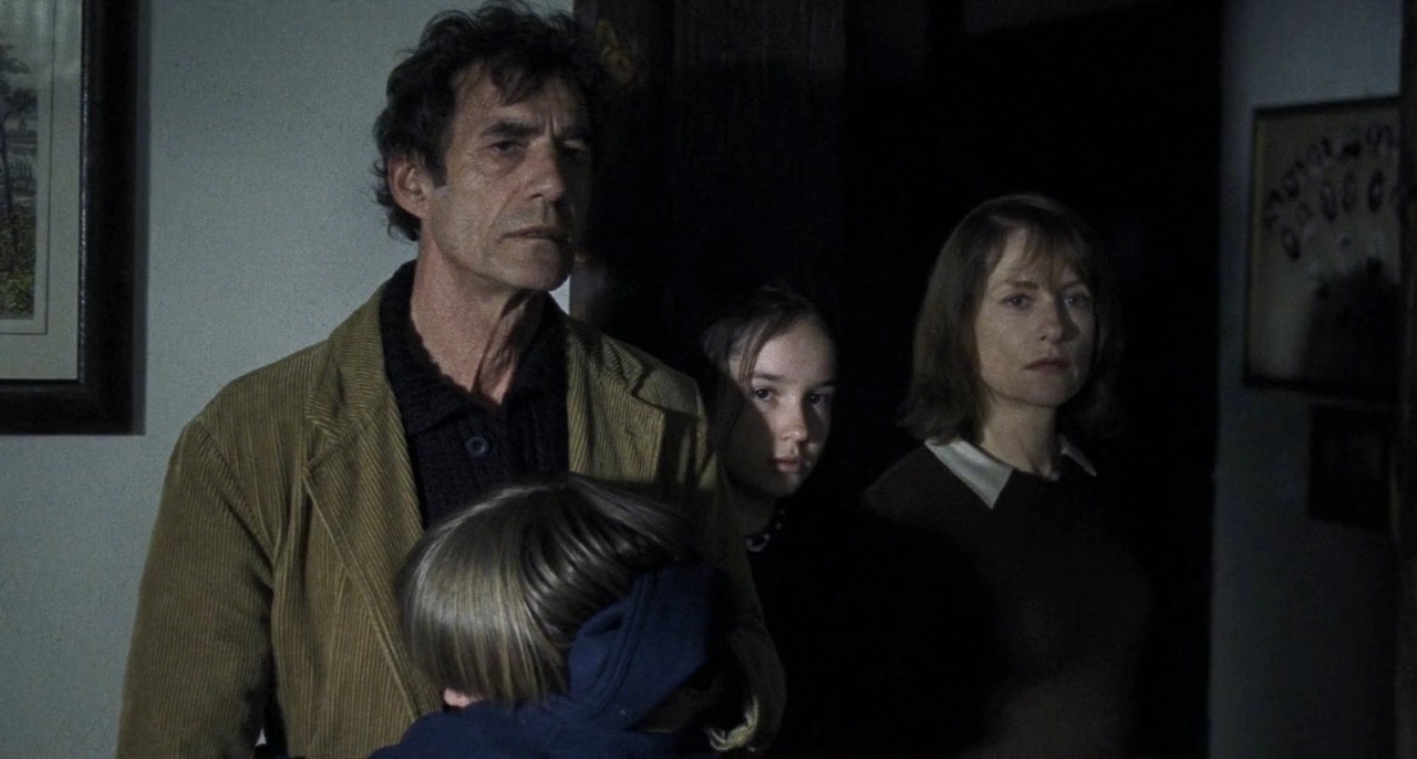Daniel Duval and Isabelle Huppert in Time of the Wolf (2003)