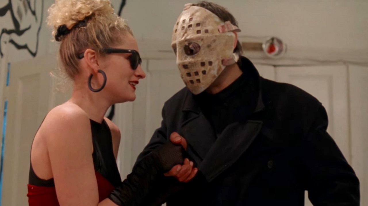 The blind girl (Fiona Evans) and the slasher maniac (Gregory Cox) in love in Unmasked Part 25 (1988)