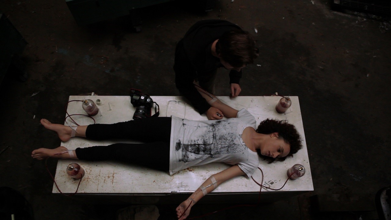 Kevin Zegers drains Keisha Castle-Hughes blood in Vampire (2011)