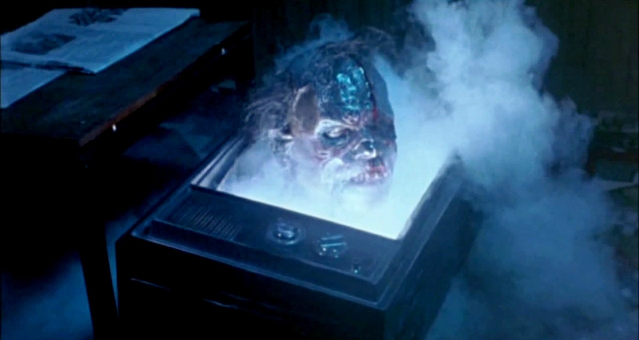 Zombies emerge from a tv set in The Video Dead (1987)