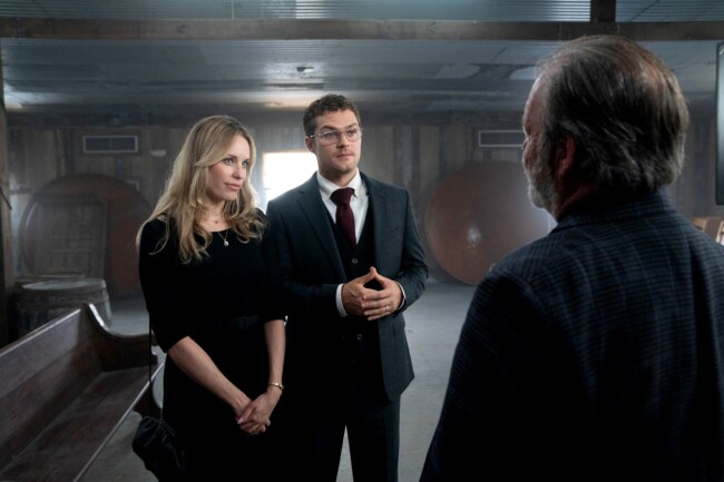 Jessica McNamee and Finn Jones in The Visitor (2022)