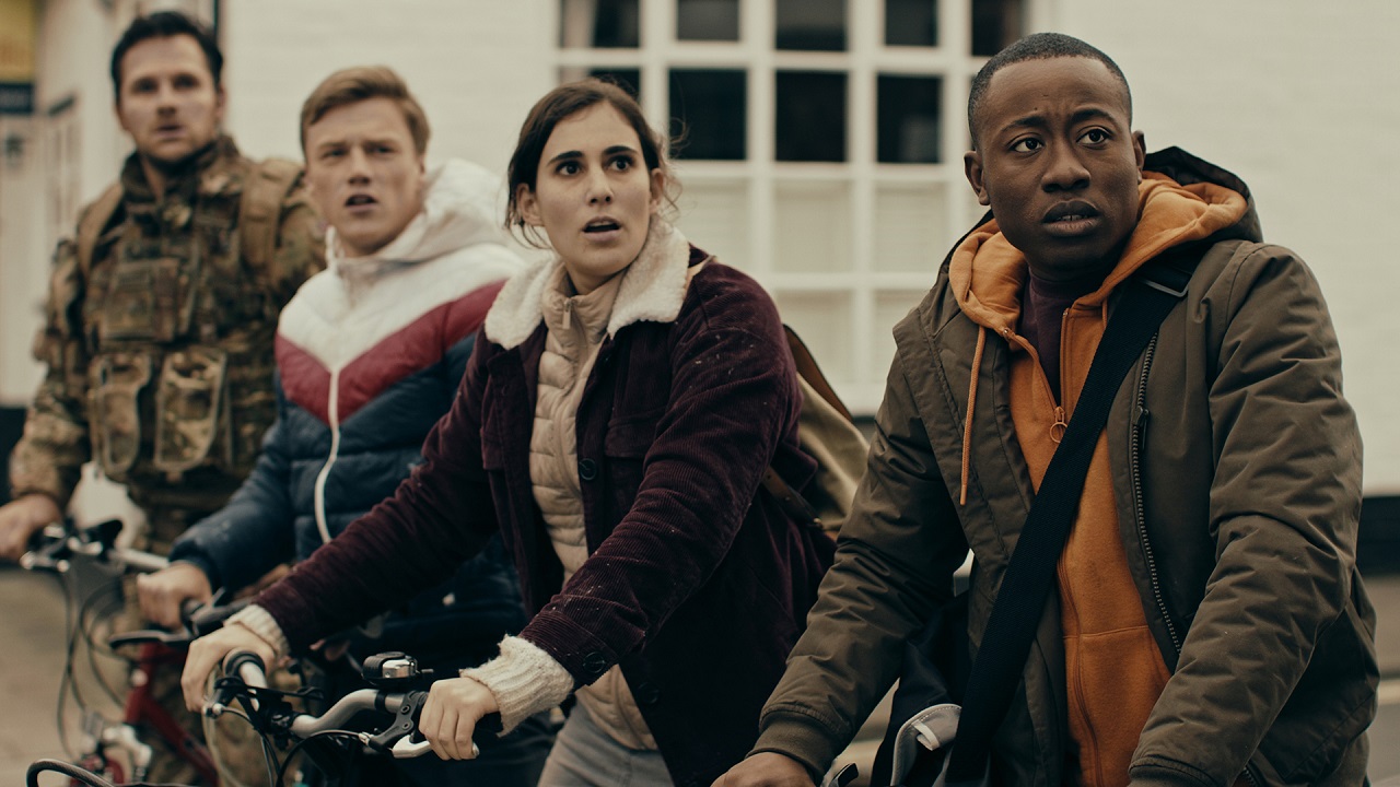 The Artilleryman (Leo Staar), Herbert Wells (Sam Gittins), Hannah (Lana Lemon) and Ogilvy (Alhaji Fafona) in War of the Worlds: The Attack (2023)