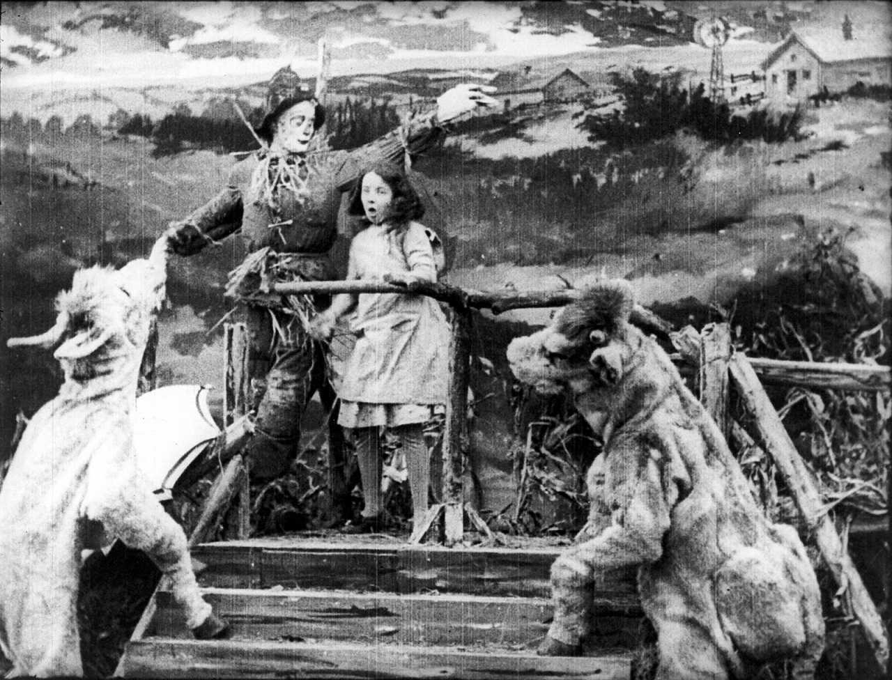 Imogene the Cow, The Scarecrow (Robert Z. Leonard), Dorothy (Bebe Daniels) and The Cowardly Lion in The Wizard of Oz (1910)