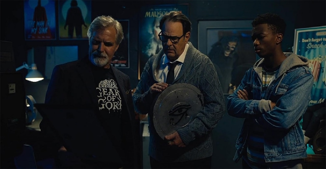 Henry Czerny, Dan Akyroyd and Marlon Kazadi in Zombie Town (2023)
