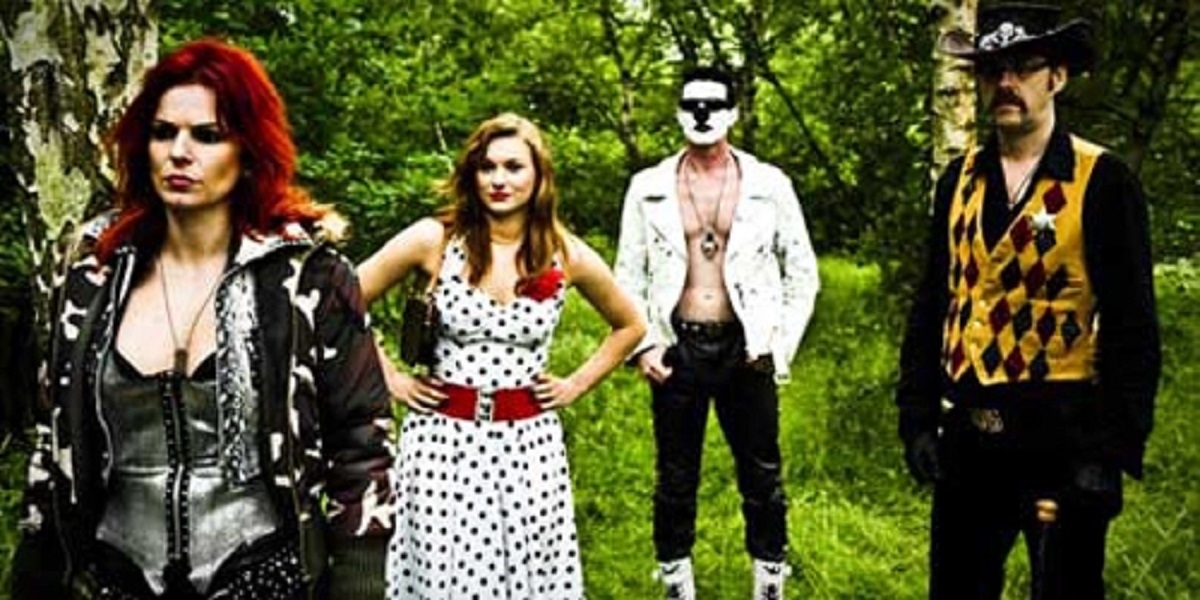 Victoria Hopkins, Kate Soulsby, Warren Speed (as Pervo the Clown) and Seymour Mace in Zombie Women of Satan (2009)