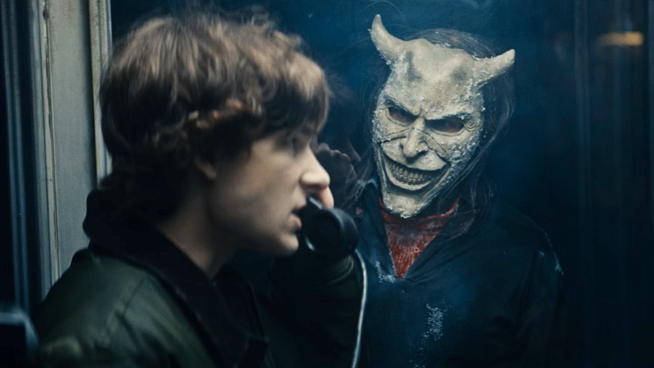 Finn (Mason Thames) takes a phone call from The Grabber (Ethan Hawke) in Black Phone 2 (2025)