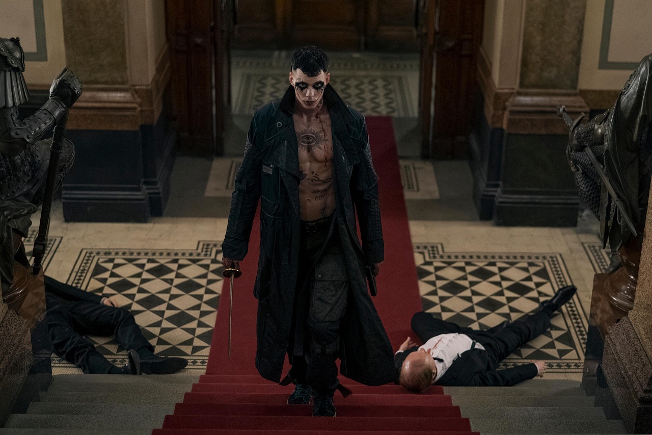 Bill Skarsgård as Eric slaughters his way through the opera house in The Crow (2024)